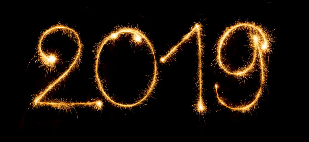 2019 with sparklers on black background